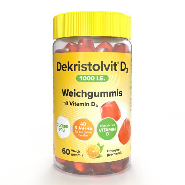 Ein Glas Dekristolvit D3-Gummibärchen mit gelbem Deckel, orangefarbenen Gummibärchen und deutschem Text auf dem Etikett.