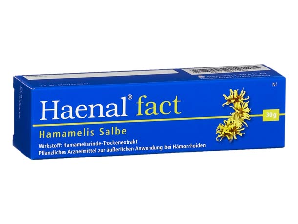 Eine blaue Schachtel Haenal fact Hamamelis Salbe gegen Hämorrhoiden mit gelben Blumen und deutschem Text.