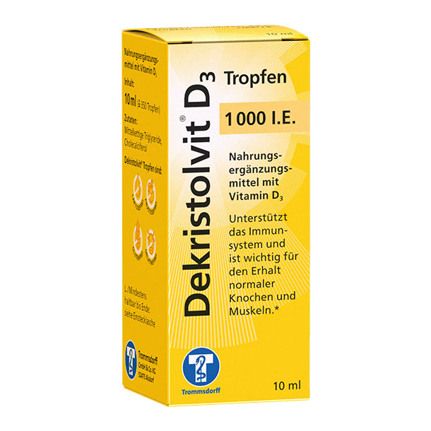 Gelbe Schachtel mit Dekristolvit D3 Tropfen, 1000 I.E., ein Vitamin D3-Präparat, 10 ml Flasche, mit deutschem Text und blauem Logo.