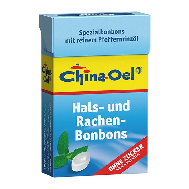 Blau-gelbe Schachtel mit China-Oel Menthol-Halspastillen, aufgedruckt mit der Aufschrift „ohne Zucker“ und einem Minzblatt sowie einem Pastillenbild.