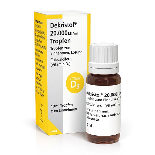 Schachtel und Flasche Dekristol 20.000 I.E./ml Vitamin-D3-Tropfen mit gelb-weißer Verpackung, beide mit deutscher Beschriftung.