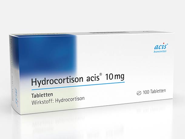 Eine Schachtel Hydrocortison acis 10 mg, enthält 100 Tabletten und ist in blau-weißer Verpackung verpackt.