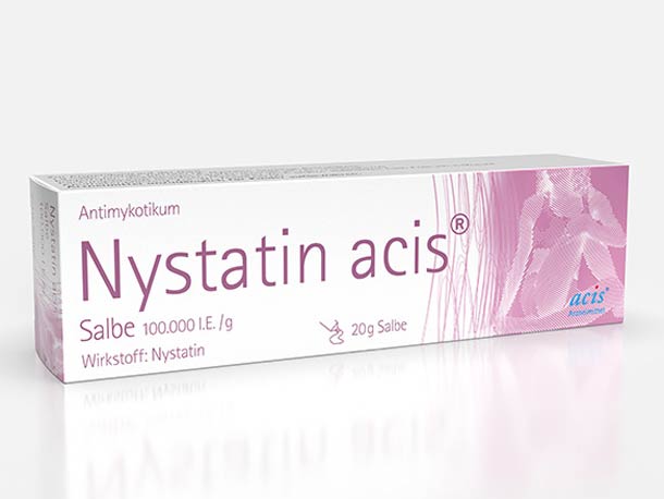 Eine Schachtel Nystatin-acis Antimykotikum-Salbe 100.000 I.E./g, 20 g, mit violetten Akzenten auf weißem Hintergrund und der Darstellung einer sitzenden Frau.
