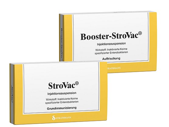 Zwei gelb-weiße Schachteln mit der Aufschrift „StroVac“ und „Booster-StroVac“-Injektionssuspensionen.