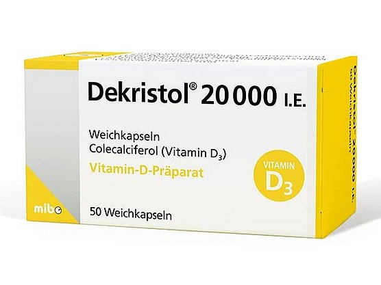 Weiß-gelbe Schachtel mit Dekristol 20000 I.E. Weichkapseln, einem Vitamin-D3-Präparat, mit 50 Kapseln.